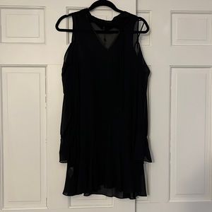 Bcbg black dress with tue detail and flounce bottom